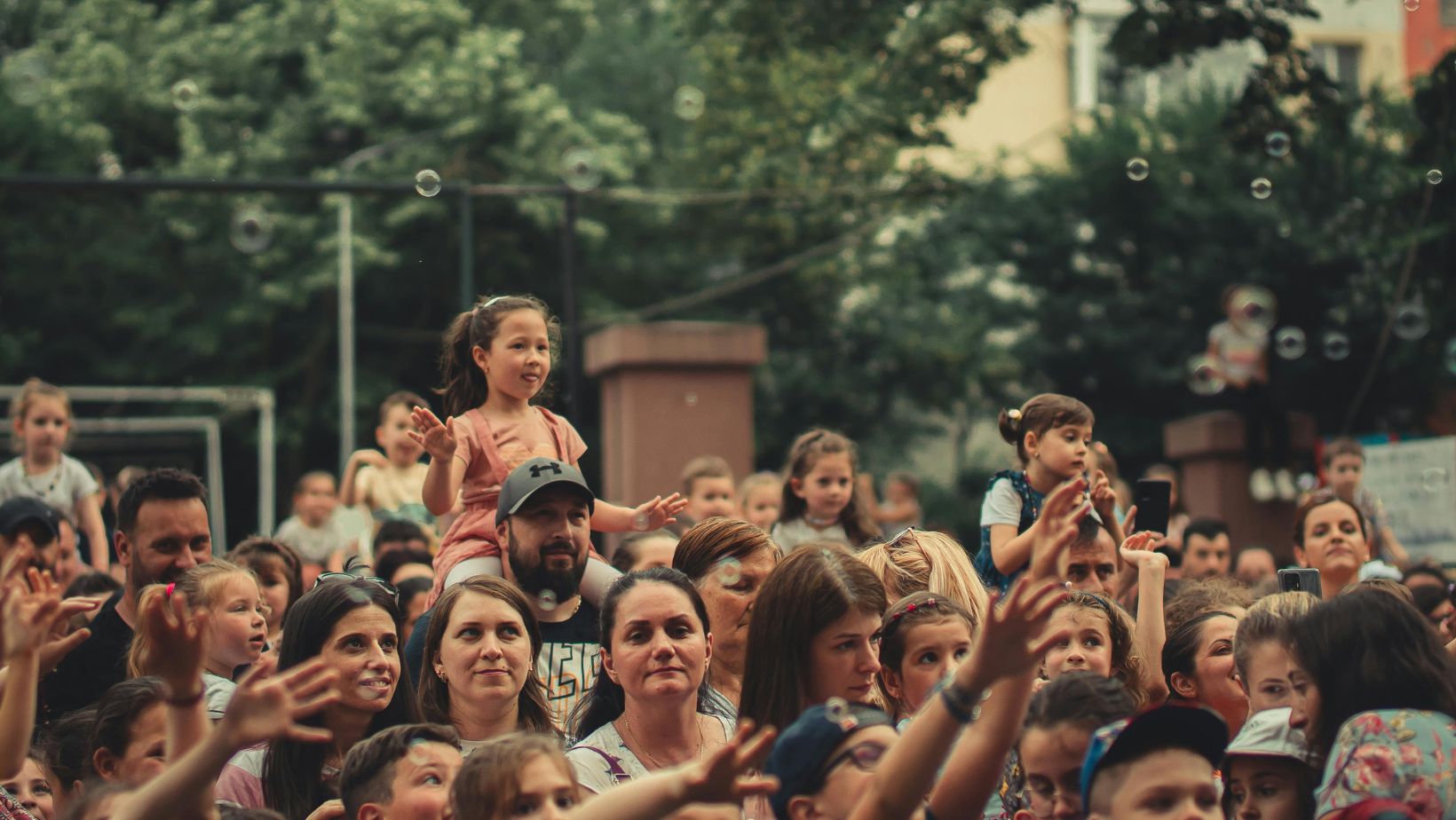 people standing in front of the stage
